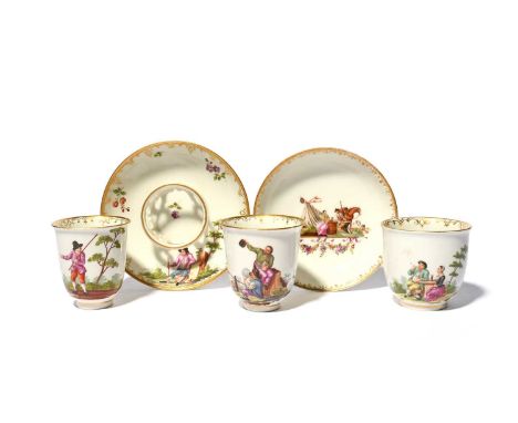 Three Vienna chocolate or coffee cups and two saucers, c.1760-70, painted by or in the manner of Andreas Oettner with pastora