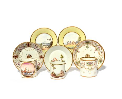 Three French porcelain coffee cans and five saucers, c.1780-1820, including a pair of Caen saucers painted with English scene