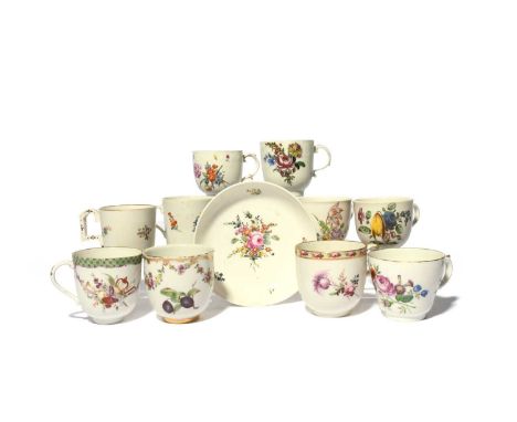 Ten Continental porcelain coffee cups or cans and a saucer, c.1750-90, variously painted with flowers, fruit and musical inst