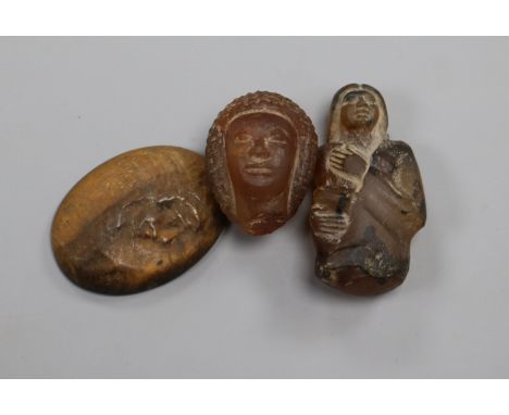 Ancient Egyptian or later - two chalcedony quartz carvings and a tiger's eye portrait cabeochon