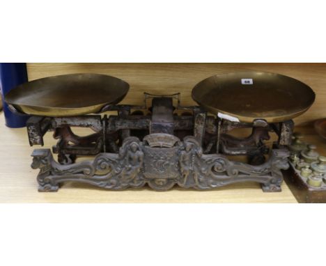 Large metal kitchen scales and a set of brass weights