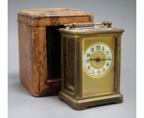 A carriage clock, case and key