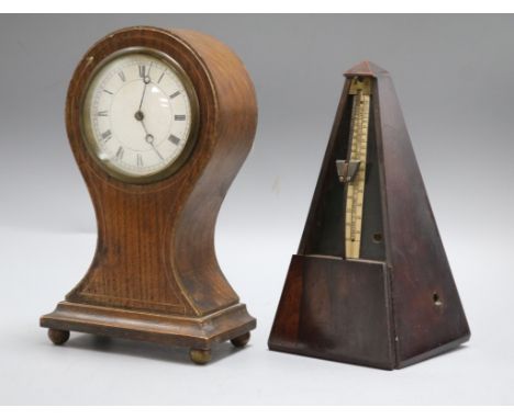 A balloon mantel clock and metronome Clock H.24cm