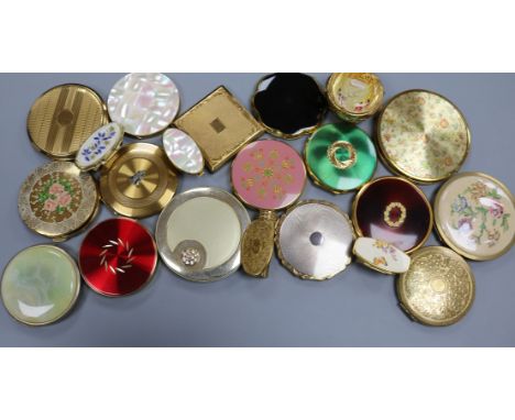 A collection of vintage powder compacts and lipstick holders, various makers, including a Kigu 'basket' compact with swan dec