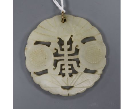 A carved jade pendant