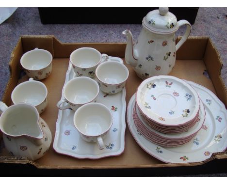 A Villeroy & Boch part coffee service comprising one serving platter, one large plate, six small plates, six teacups, six sau