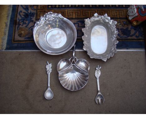 A selection of pewter items including serving dishes, a salad spoon and fork etc.