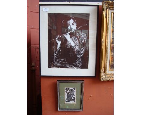 A framed woodcut of an eagle owl numbered 2/10 Hilda Frank, 13 x 8.5cm together with a framed papercut of a lady playing the 