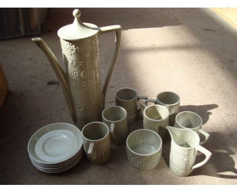 A 'Totem' pattern Portmeirion part service comprising six cups, six saucers, coffee pot and sugar bowl. 