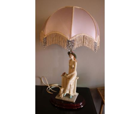 A large composite figural table lamp. (76cm)  