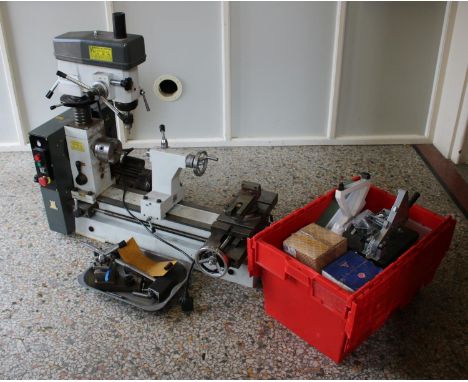 A Chester Machine Tools Model B lathe with parts and accessories.  