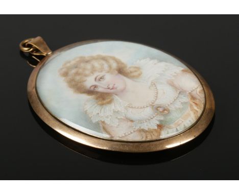 After Richard Cosway, an oval gilt frame portrait miniature of Mrs Fitzherbert wearing a portrait jewel of George IV. 8.5cm x