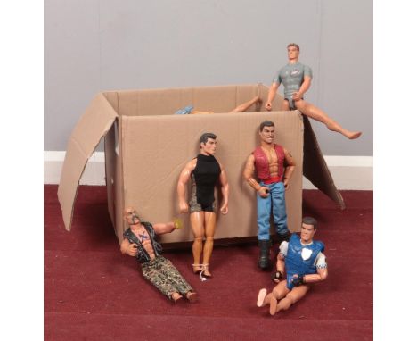 A box of vintage Action Men.  