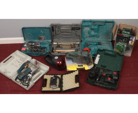 A quantity of mostly power tools. Including drills, saws, sander, etc.  
