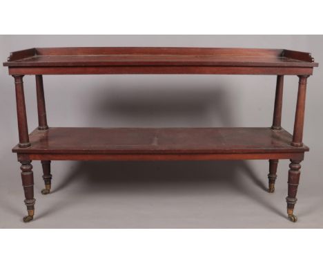 A Georgian mahogany two tier buffet side table. Height 104cm Width 173cm Depth 53cm.  General age wear.