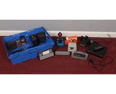 A box of assorted items. To include a Polaroid colorpack 80, a Polaroid DVD player Model no DV2202B with remote etc.  