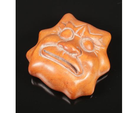 A Japanese box wood Netsuke carving, with Demon on one side and Buddha on the reverse, H: 4cm, W:4.5cm  