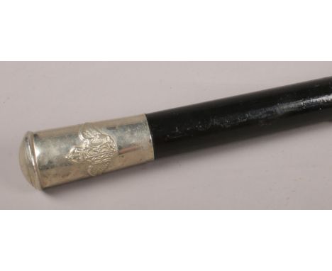 An ebonised bamboo sword stick with Royal Flying Corps white metal pommel. Blade length 61cm.  