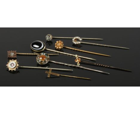 A quantity mostly 19th century stick pins. Including a Victorian 9ct peridot example, etc.  