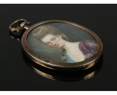 A fine quality 18th century English George II portrait miniature. 4cm x 3cm.  