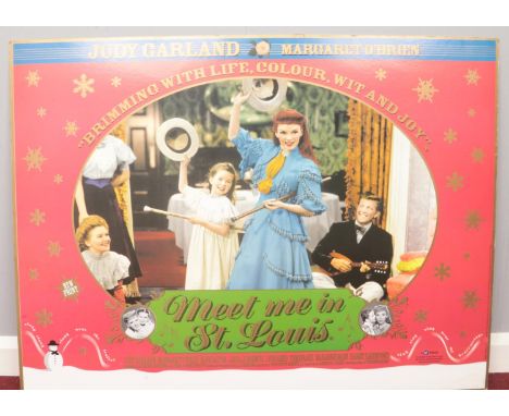 A Judy Garland 'Meet Me In St Louis' Quad Film Poster. Comprising of a vintage BFI reprinted on card poster. H: 76cm, W: 101.