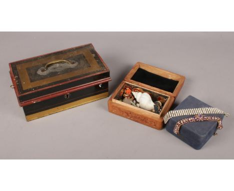 Three assorted items. To include a deeds box, a wooden carved trinket box and two costume jewellery bracelets.  