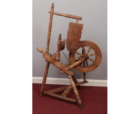 A vintage spinning wheel.  
