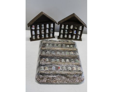 A selection of vintage thimbles &amp; display stands 