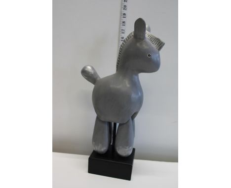 A vintage wooden wonkey donkey 