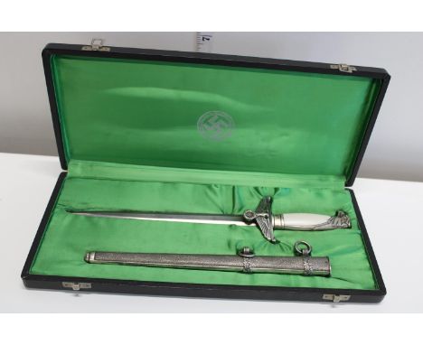 A German Diplomatic dress dagger in a silk lined presentation box. The blade is marked F W Holler Berlin. A 1970's reproducti