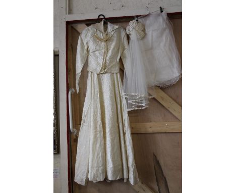 An original vintage wedding dress and accessories 