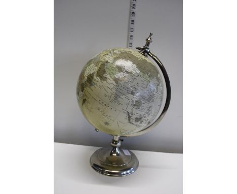 A vintage chrome based World globe 