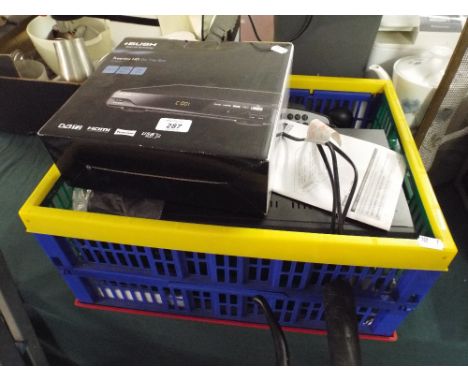 A Box Containing Digital TV Recorder, Sky Box, Set Top Box etc