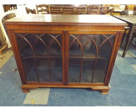 A Mahogany Glazed Cabinet on Bracket Feet 