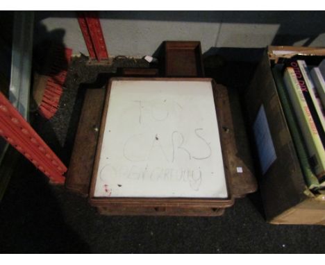 A bygone cribbage board with integral drawers
