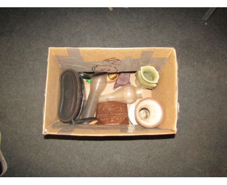 A box of mixed items to include a pair of rainbow binoculars, a carved soapstone vase, a copper embossed 'Bonn' plaque, a pol