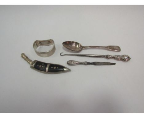 A selection of silver including a napkin ring, button hook, etc and a miniature brass knife (5)