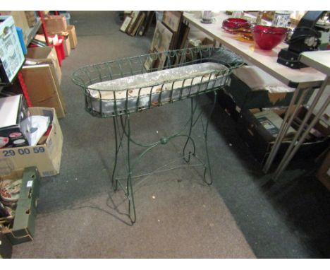 A green painted wirework planter, 72cm x 75cm