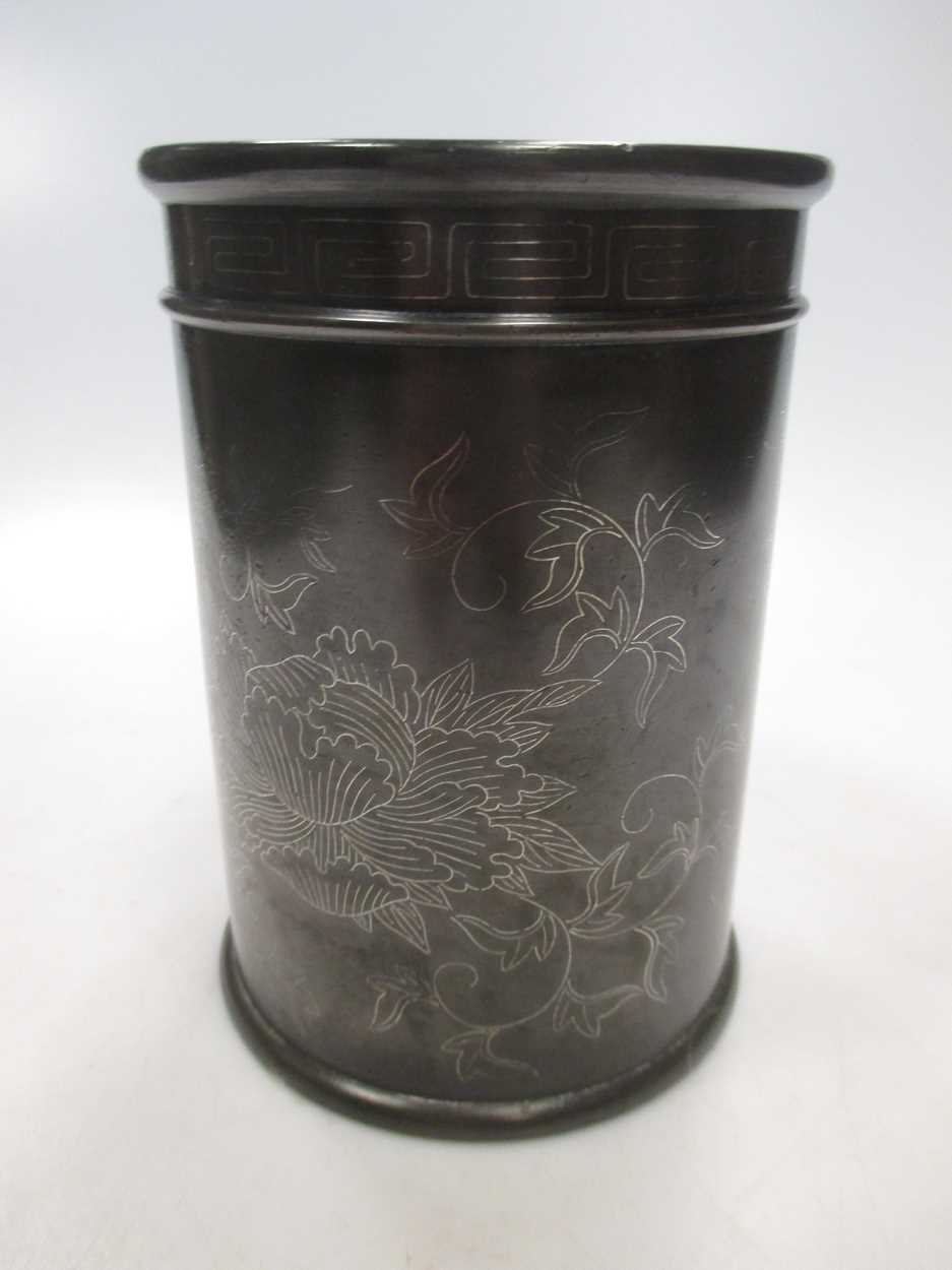 A Japanese bronze brush pot with engraved folate decoration and three ...