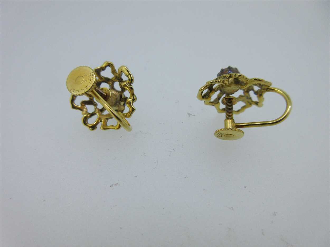 A pair of 9ct gold and diamond screw back earrings, in Cheffins Fine Art