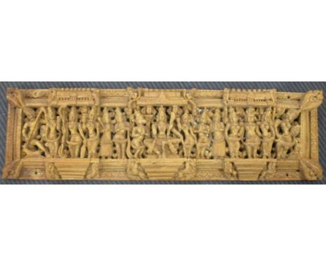 An Indian carved panel, 21 x 72cm
