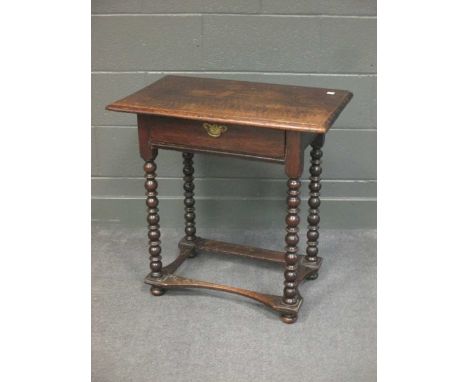 An 18th century and later oak side table with frieze drawer on bobbin turned legs, 70 x 70cm