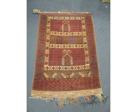 with a carved pole for hanging, 164 x 106cm; together with a text panel (2)