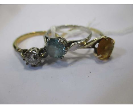 A single stone diamond ring together with a citrine ring and a blue zircon ring (3)