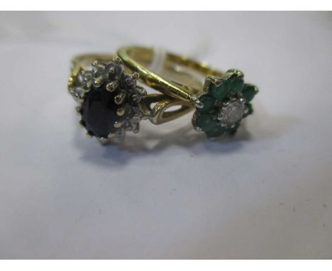 An emerald and diamond cluster ring together with a sapphire and diamond cluster ring (2)