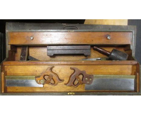 A good collection of antique moulding planes and other woodworking tools contained within two pine tool chests and two carry 