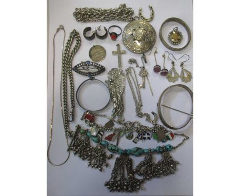 A collection of silver jewellery including a fringe necklace, a charm bracelet, a child's bangle and a watch chain (qty)