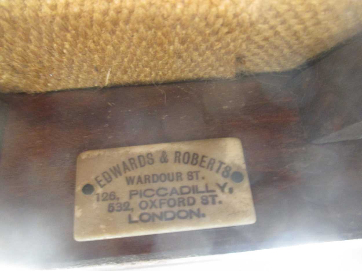 A pair of Edwards & Roberts Piccadilly mahogany chairs with shield