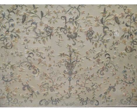 A large silk embroidered foliate panel, circa 1900, within a gilt frame, 106 x 140cm