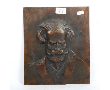 An embossed copper portrait plaque, impressed Renzo, 1946, height 28cm 